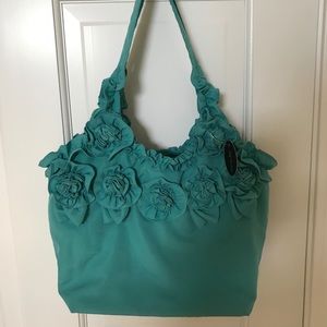 Teal shoulder bag with floral details